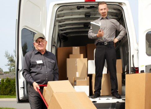 Furniture pick-up team collecting bulky household items in Bethnalgreen