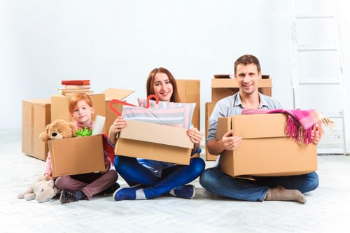 Office relocation planning in Bethnalgreen with moving crates and office furniture
