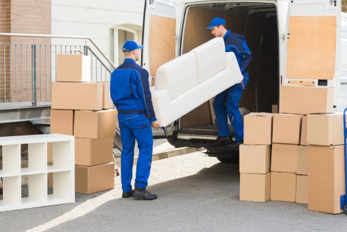 Assorted moving boxes and protective packing supplies