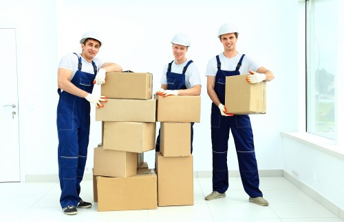 Specialist piano removals team planning a careful move in Bethnalgreen