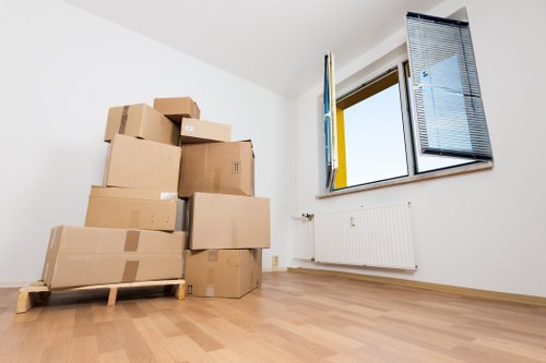 Boxes and furniture prepared for a house removal in East London