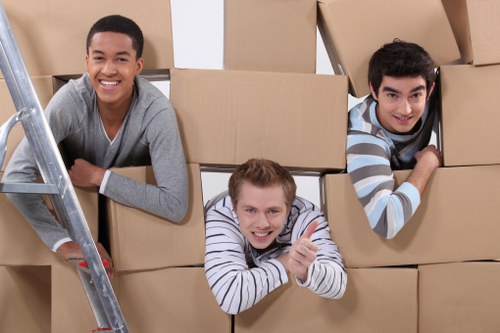 Local moving team organising packing supplies in Bethnal Green