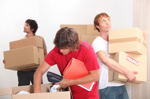 Loading furniture and boxes into a hire truck for an East London move