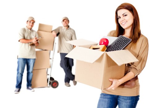Packed boxes and furniture prepared for removal truck hire