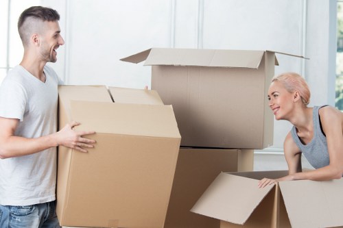 Packing and loading household items for a move in East London