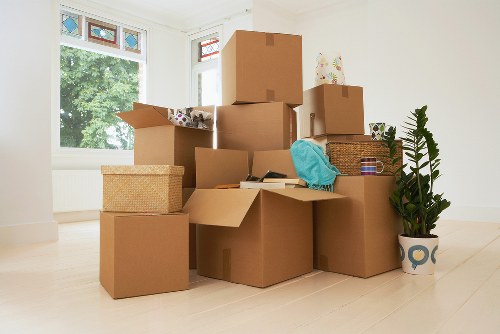 Careful wrapping and loading of household furniture for a move in Bethnalgreen
