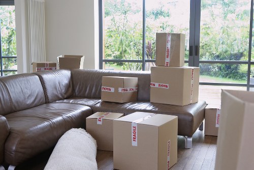 Careful loading of business items for an office relocation in East London