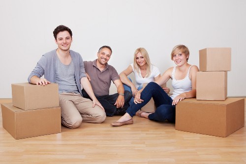 Team member using safe lifting technique during a move